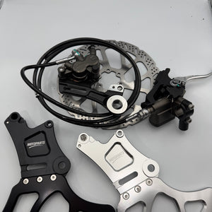 OEM LBX Pro Ultra Brake Kit with chrome and black brackets