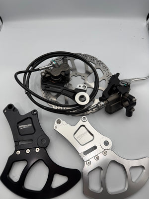OEM LBX Pro Ultra Brake Kit with chrome and black brackets